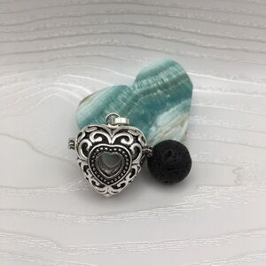 Heart Aromatherapy Silver tone Locket.  Lava stone included.